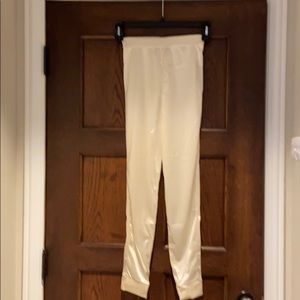 Satin , ivory colored leggings.